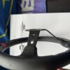 Side profile showing the depth and padded black leather rim of the Avtosh sport steering wheel.